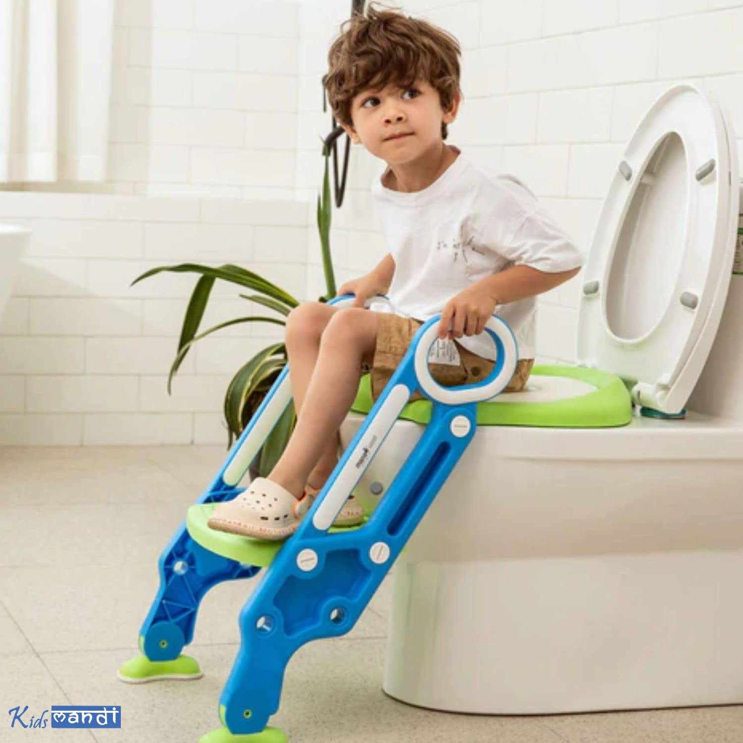 KIDS MANDI potty trainer with safe handrails for toddlers.