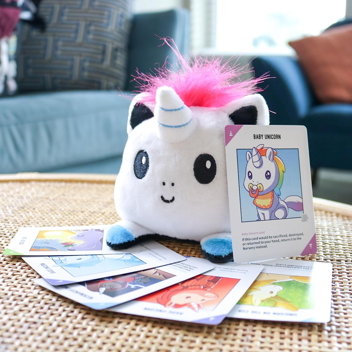 Kids Mandi Unstable Unicorns card game with magical creatures concept